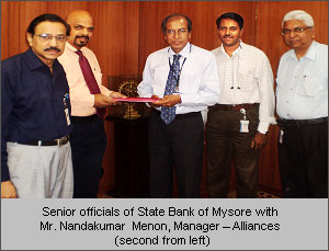 Senior Officials of State Bank of Mysore with Mr. Nandakumar Menon, Manager -  Alliances (second from left)